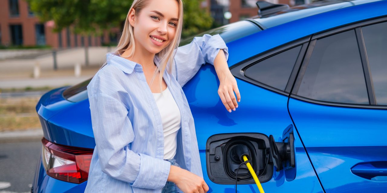 https://quantiphy.com.au/wp-content/uploads/2026/04/young-woman-stands-next-to-her-electric-car-while-2026-02-04-20-18-36-utc-1280x640.jpg